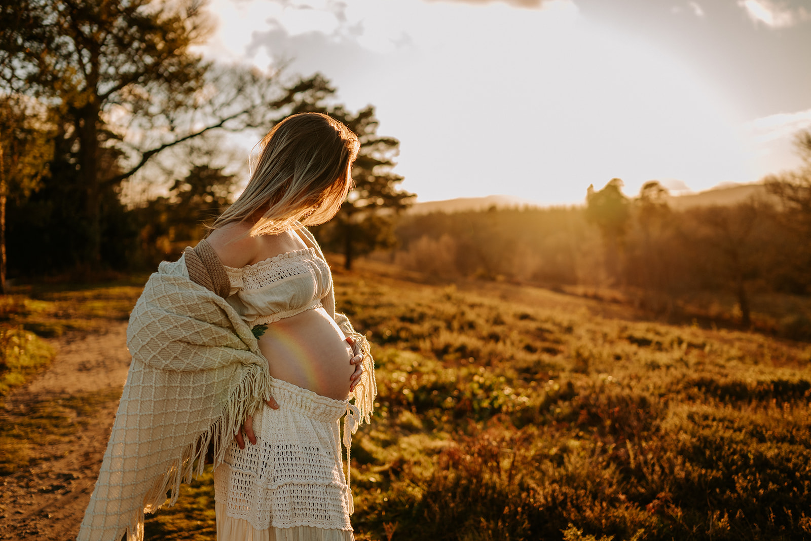 Mum-to-be posing at a golden field, maternity photographer West Sussex