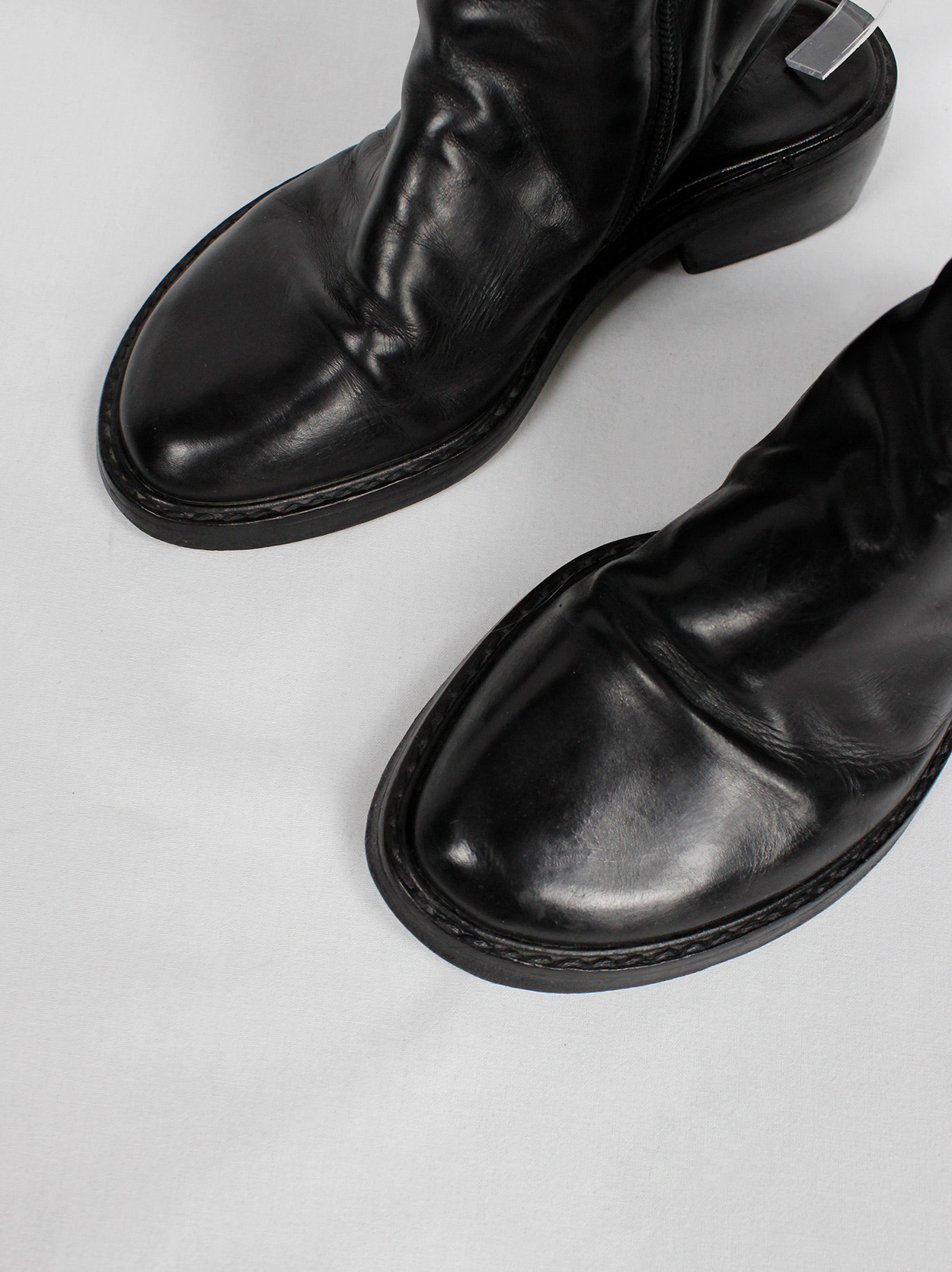 Ann Demeulemeester black ankle boots with cut out heel (36