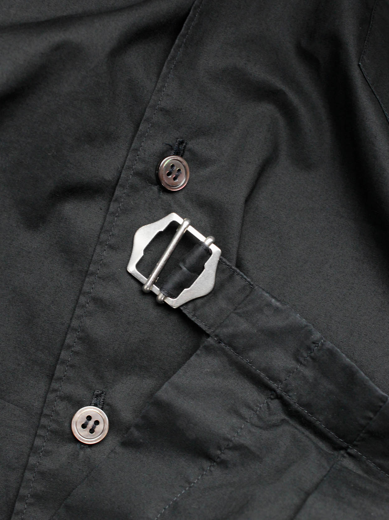 Comme des Garçons tricot black shirt with pleated peplum on the 