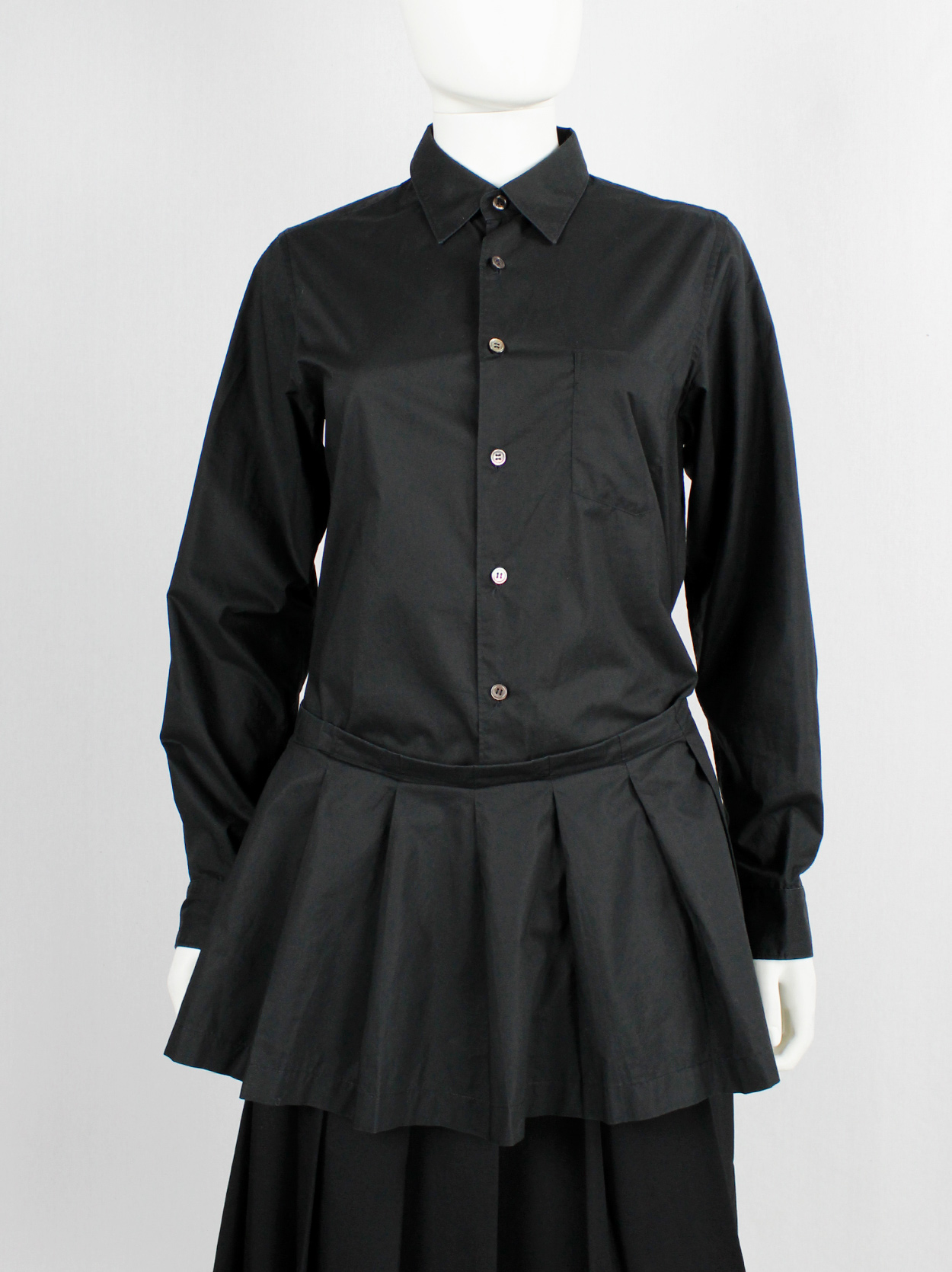 Comme des Garçons tricot black shirt with pleated peplum on Comme des Garçons tricot black shirt with pleated peplum on