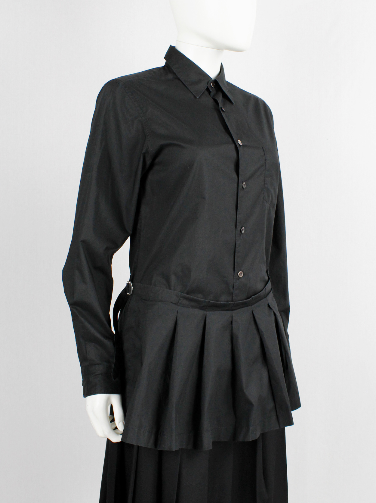 Comme des Garçons tricot black shirt with pleated peplum on the 