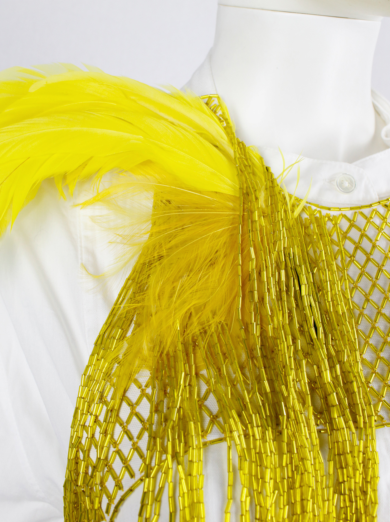Dries Van Noten yellow beaded harness with feathers and beaded 