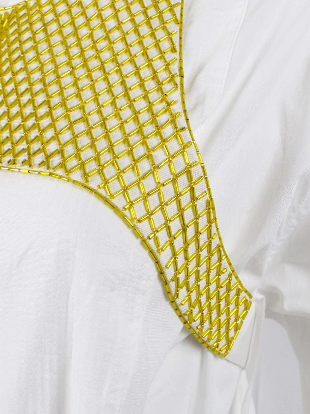 Dries Van Noten yellow beaded harness with feathers and beaded 