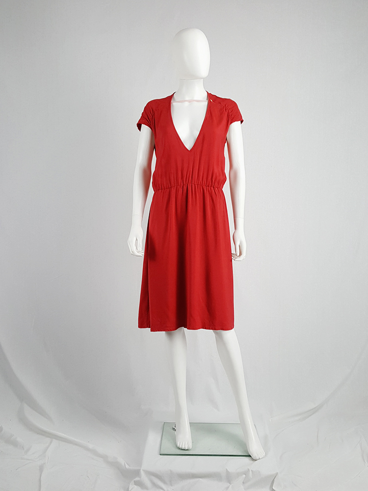 Maison Martin Margiela red dress with pink strap across the
