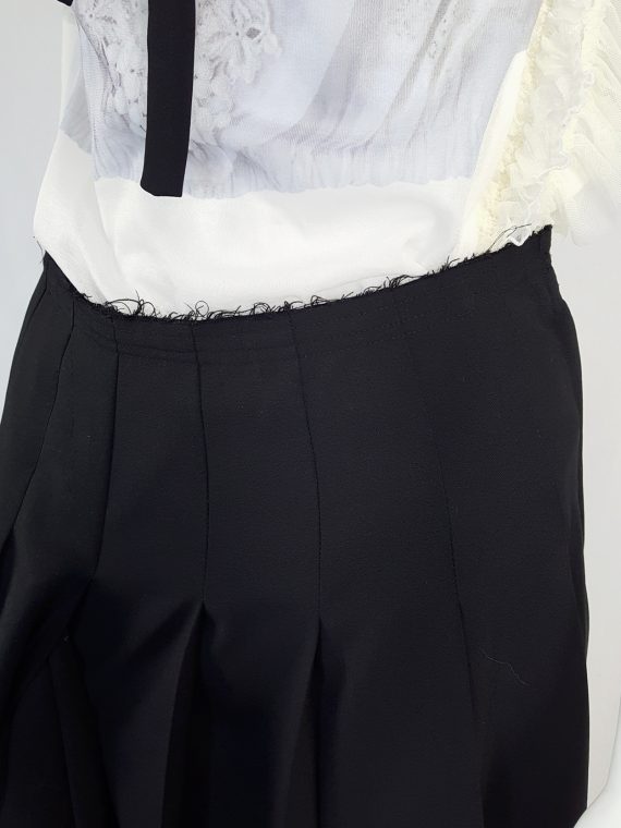 Comme des Garçons black pleated skirt with oversized braid