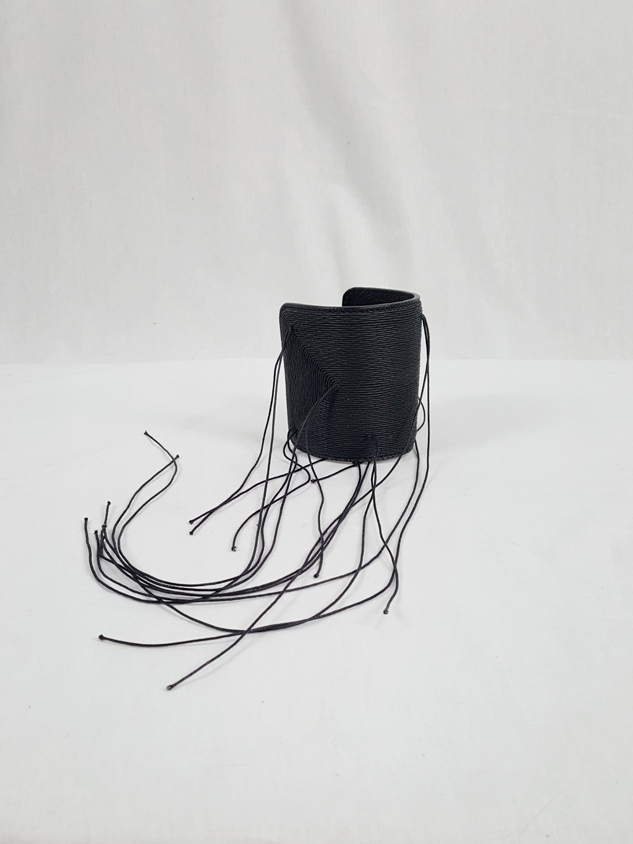Ann Demeulemeester black leather bracelet with long threads 