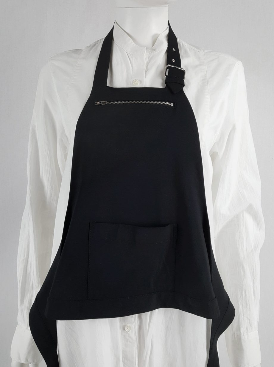 Lieve Van Gorp black short apron with belt strap and zipper — 1990's