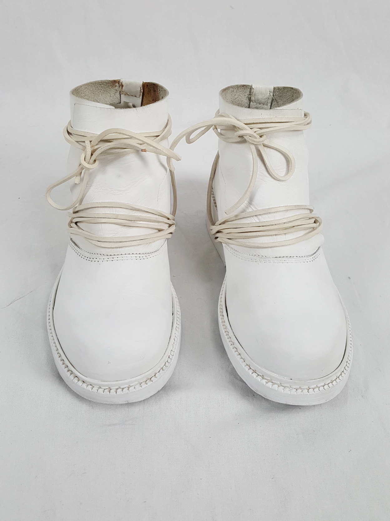 Dirk Bikkembergs white boots with front flap and laces through the 