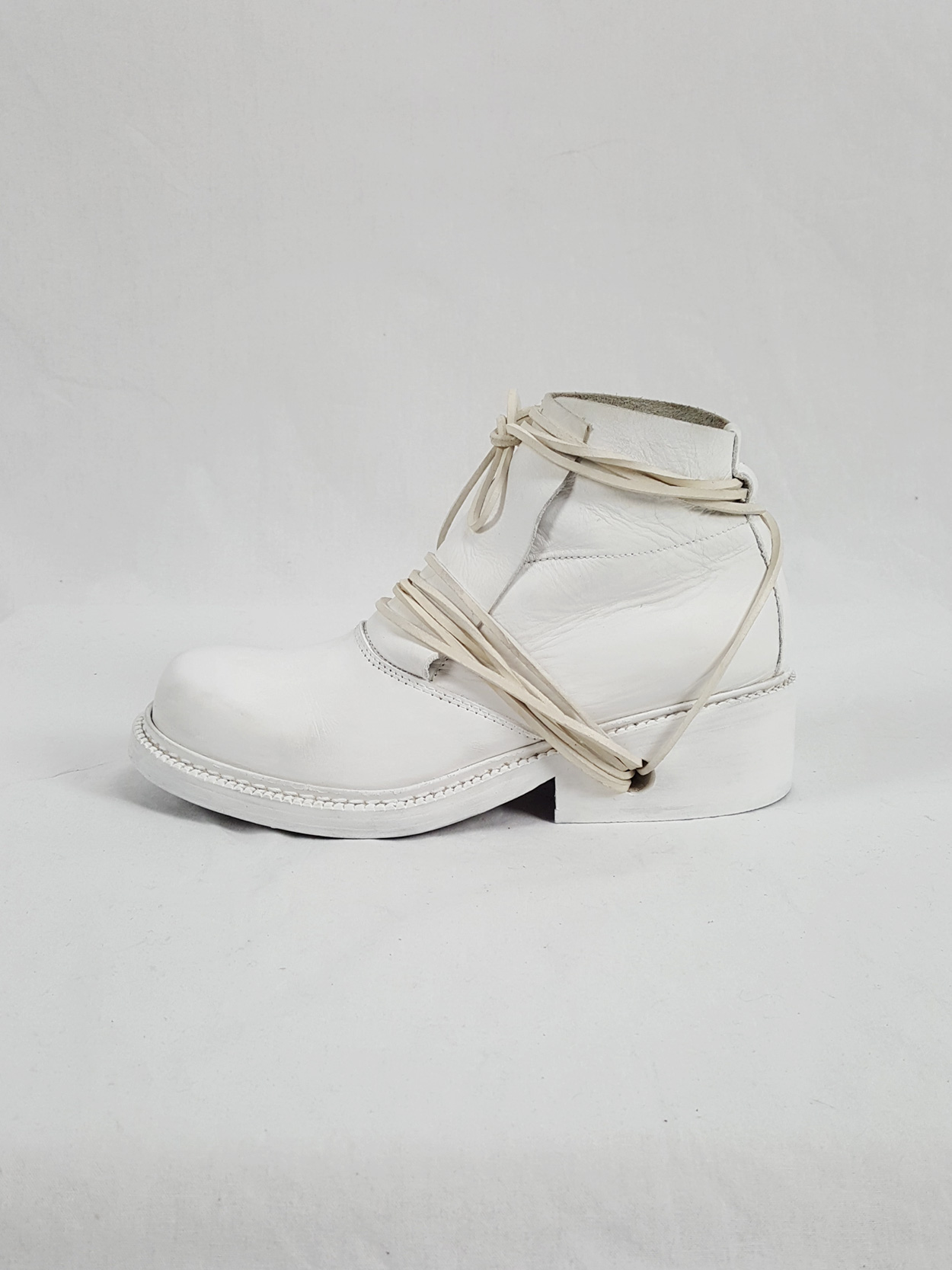 Dirk Bikkembergs white boots with front flap and laces through the 