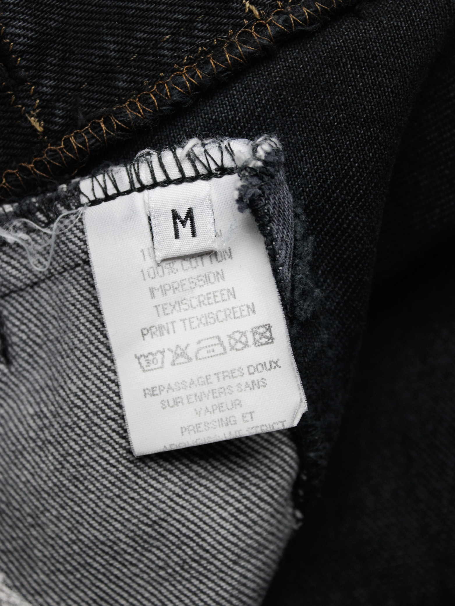 Maison Martin Margiela artisanal denim trousers with cut-off waist 