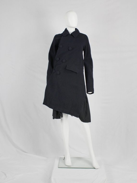 Comme des Garçons Comme blue coat twisting around the body