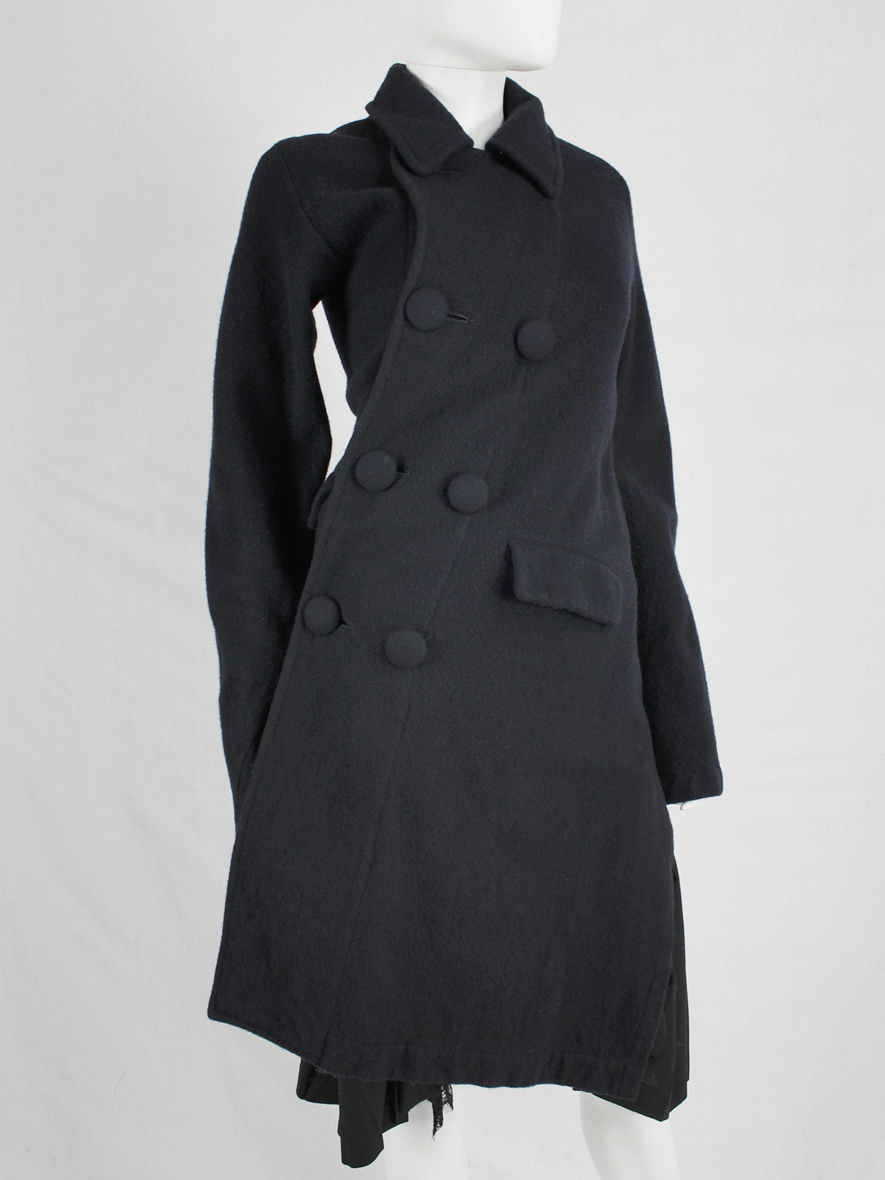 Comme des Garçons Comme blue coat twisting around the body