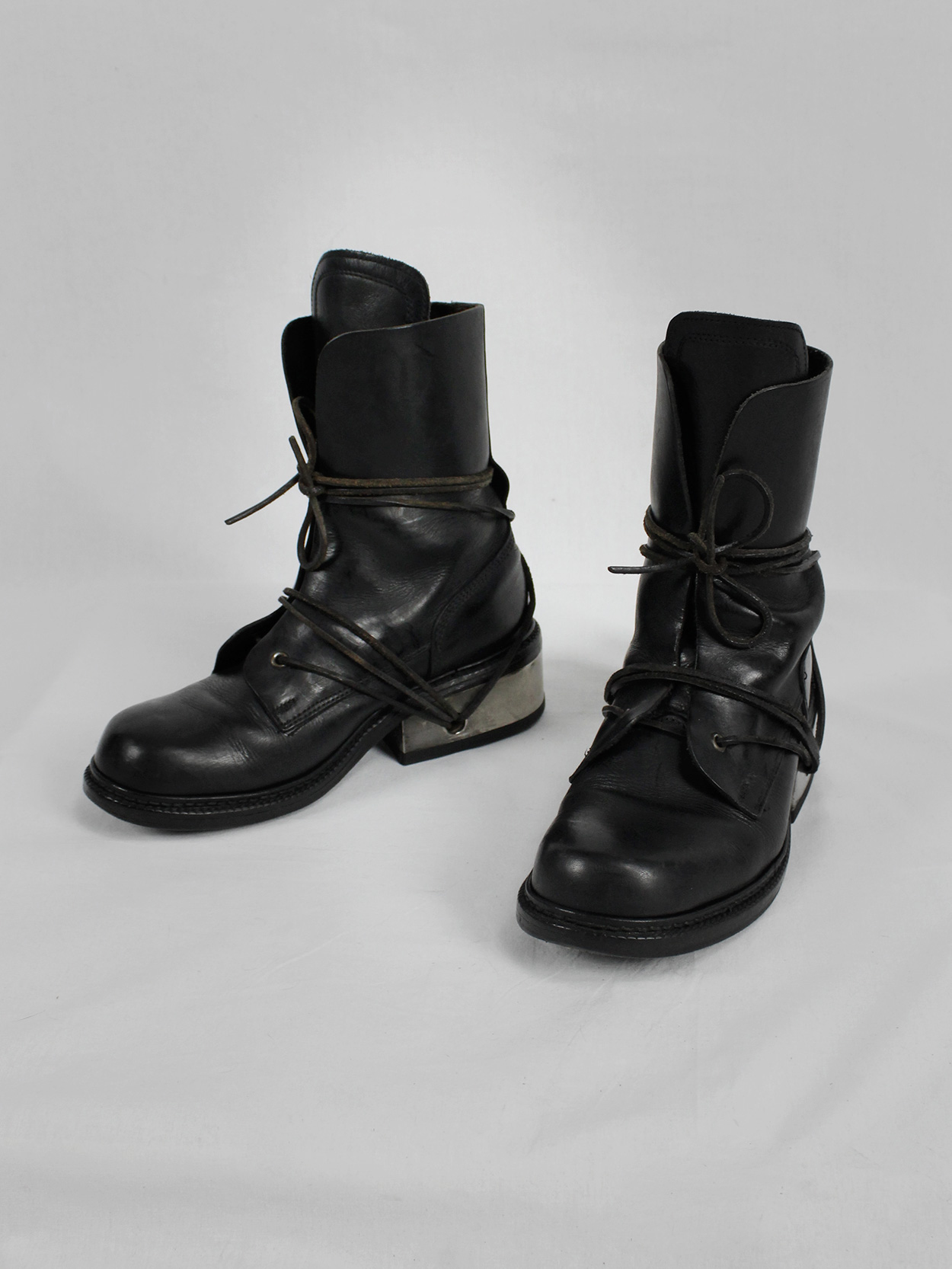 Dirk Bikkembergs black tall boots with laces through the metal