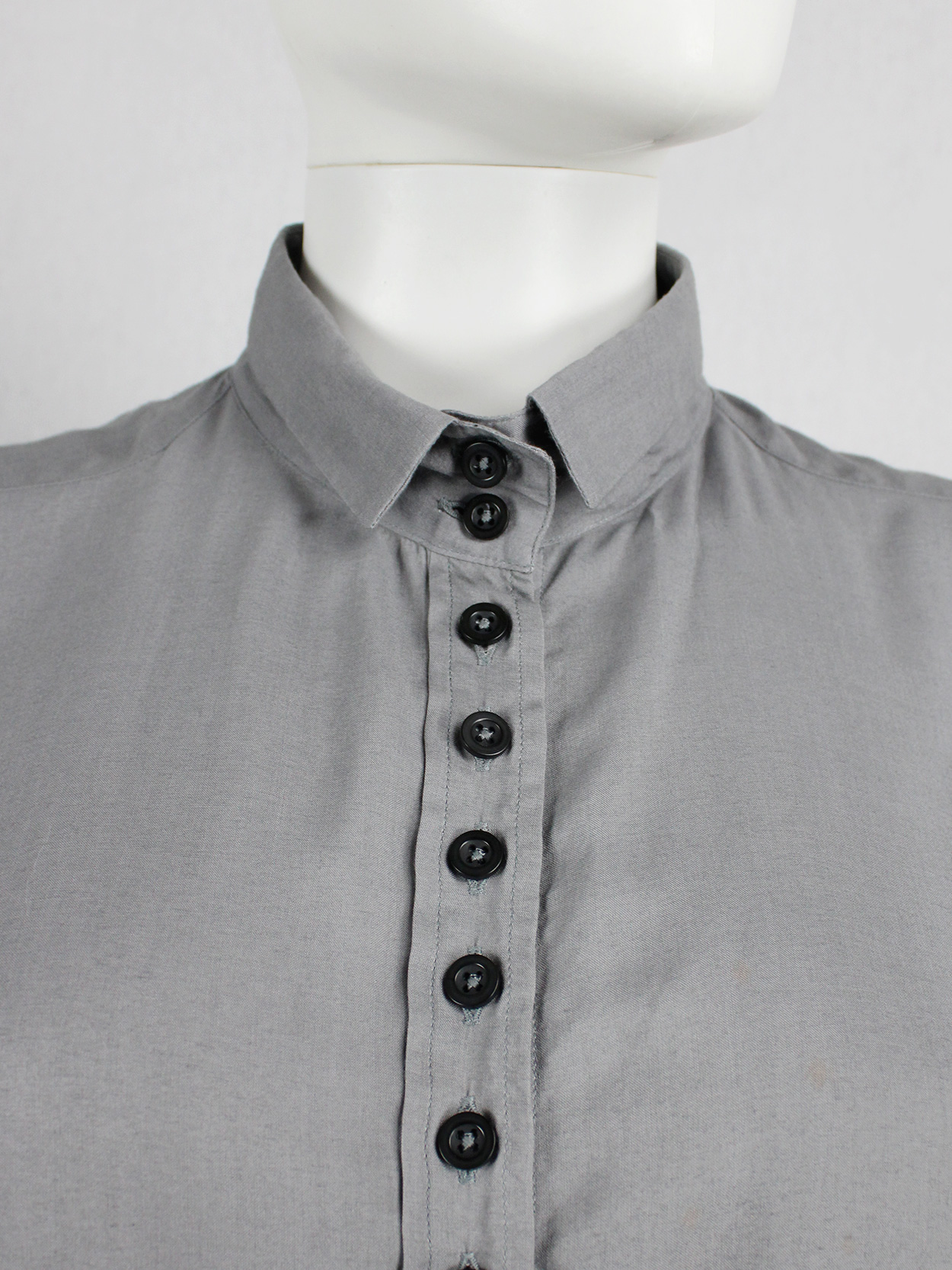 Ann Demeulemeester grey long shirt with many black buttons Ann Demeulemeester grey long shirt with many black buttons