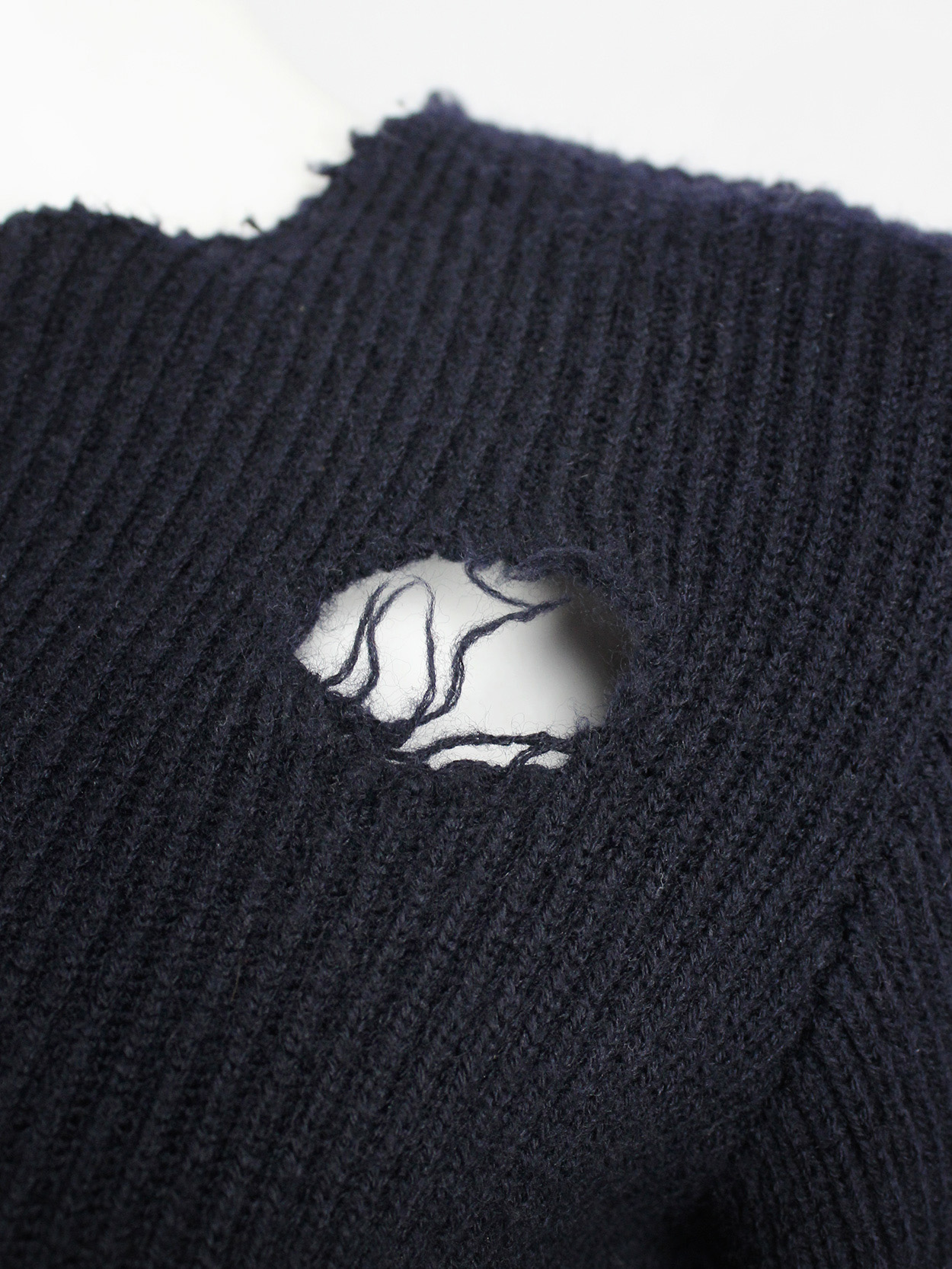 Maison Martin Margiela blue destroyed jumper with holes — fall 