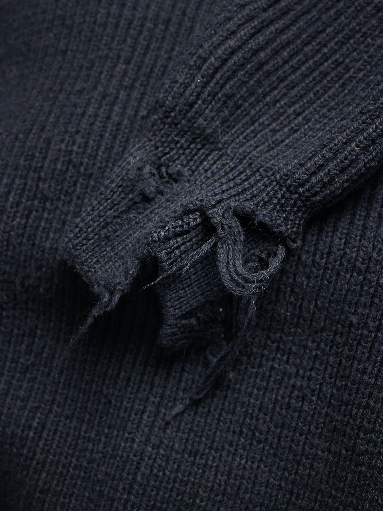 Maison Martin Margiela blue destroyed jumper with holes — fall 