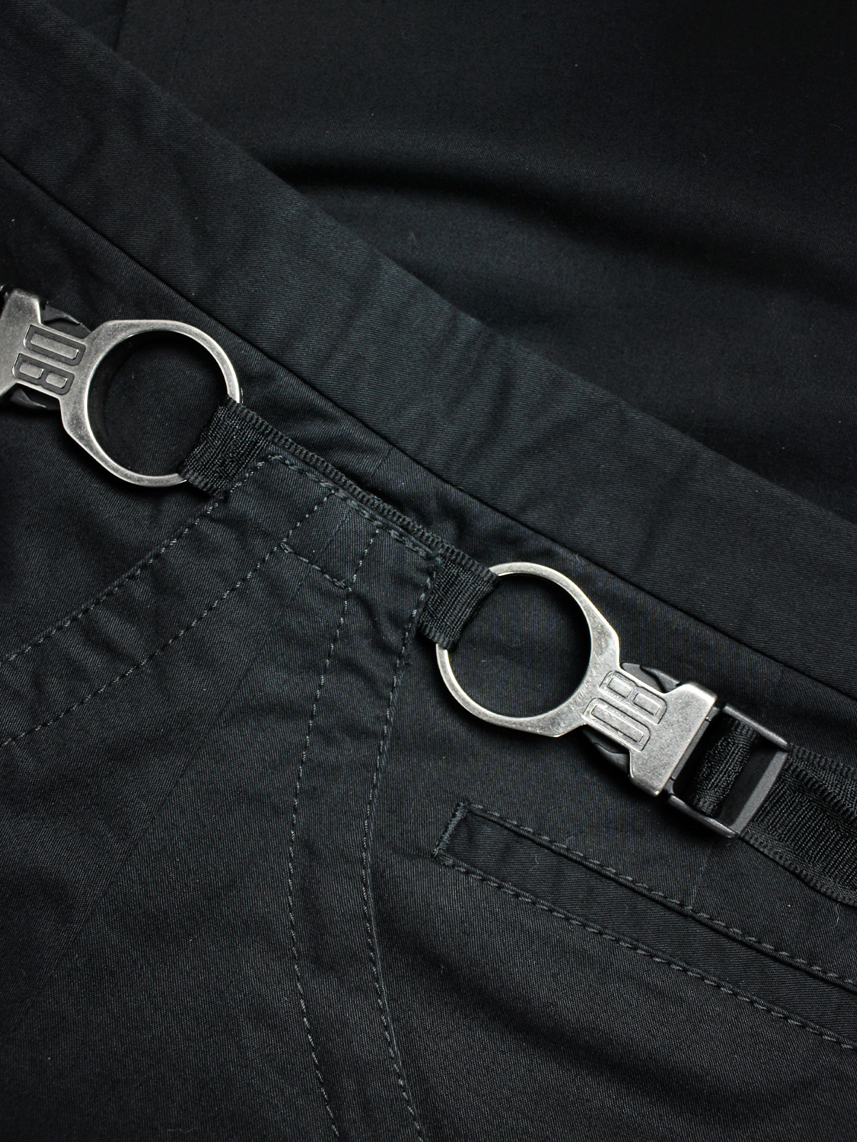 Dirk Bikkembergs black trousers with mountaineering belts