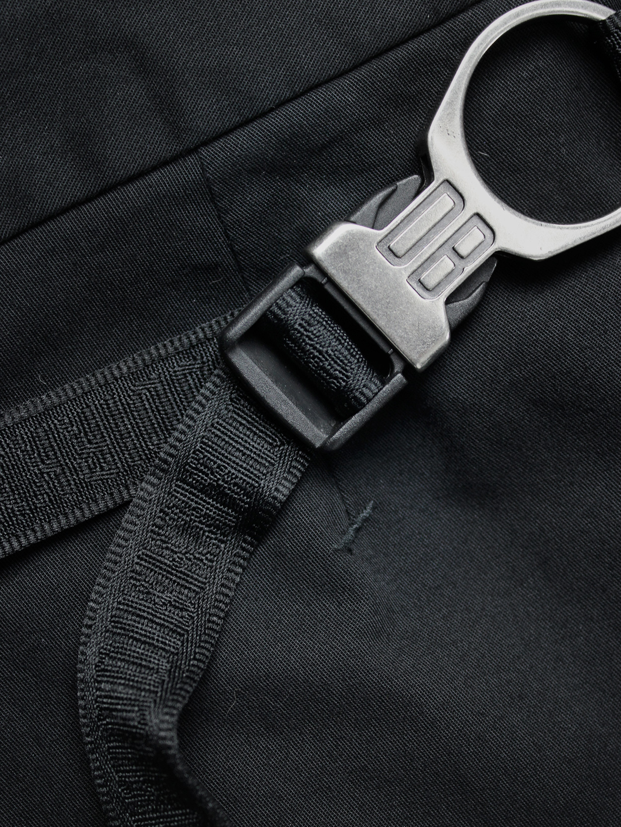 Dirk Bikkembergs black trousers with mountaineering belts