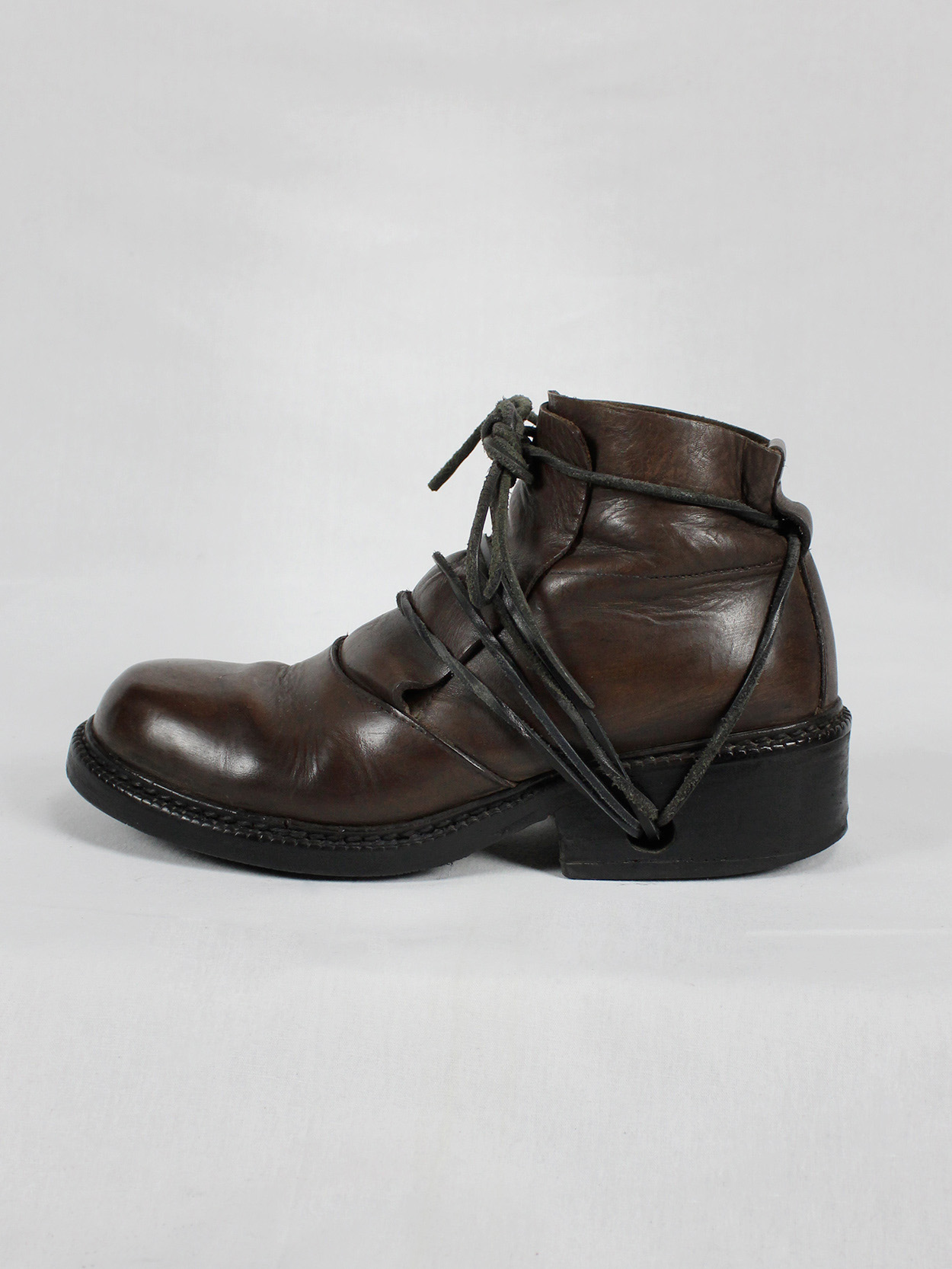 Dirk Bikkembergs brown boots with flap and laces through the soles 
