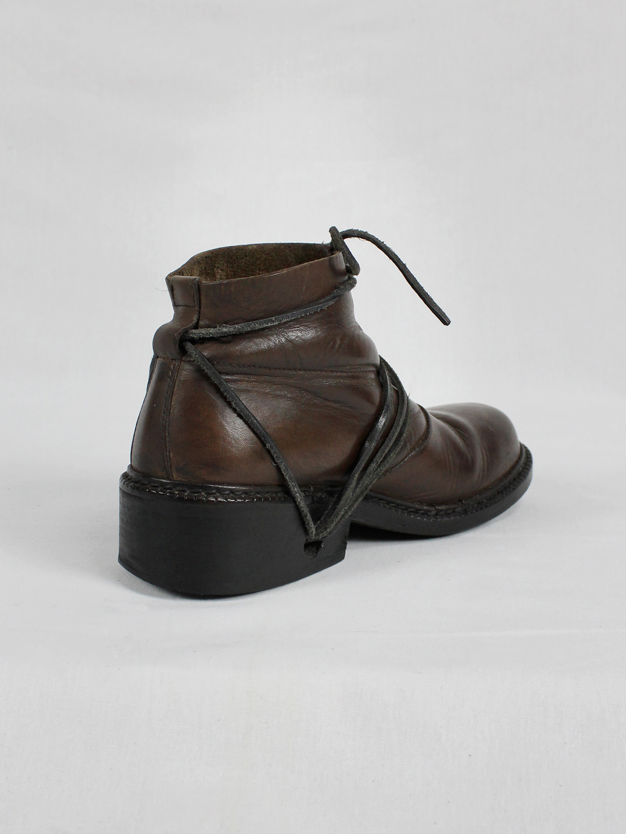Dirk Bikkembergs brown boots with flap and laces through the soles