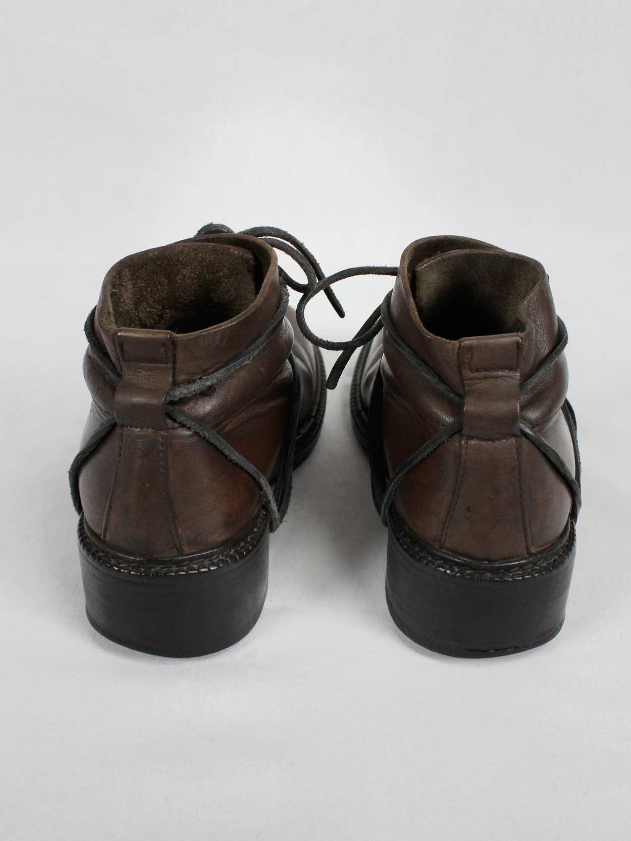 Dirk Bikkembergs brown boots with flap and laces through the soles 