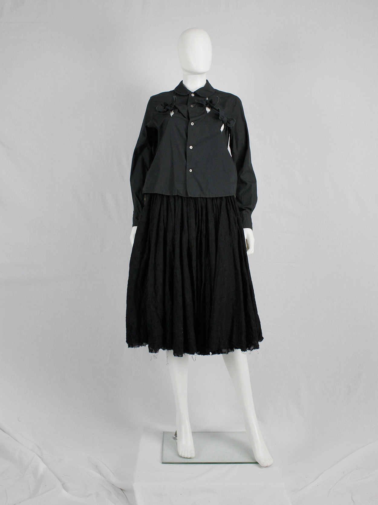 Comme des Garçons black shirt with slits and three bows — spring 