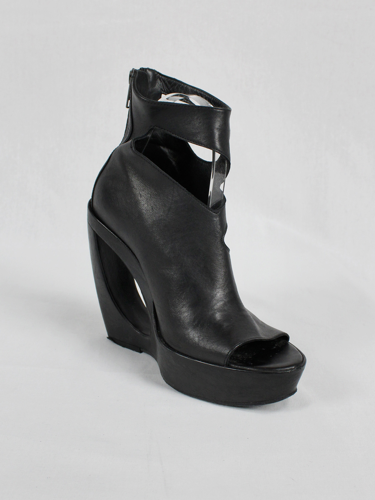 Ann Demeulemeester black platform boots with cut-out curved heel 