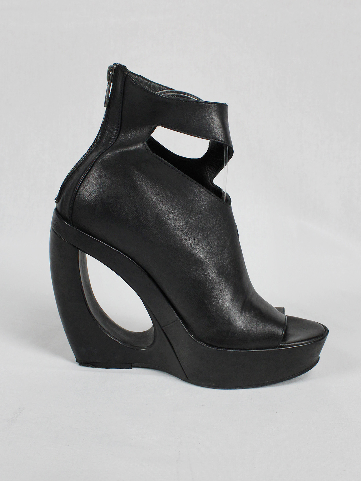 Ann Demeulemeester black platform boots with cut-out curved heel