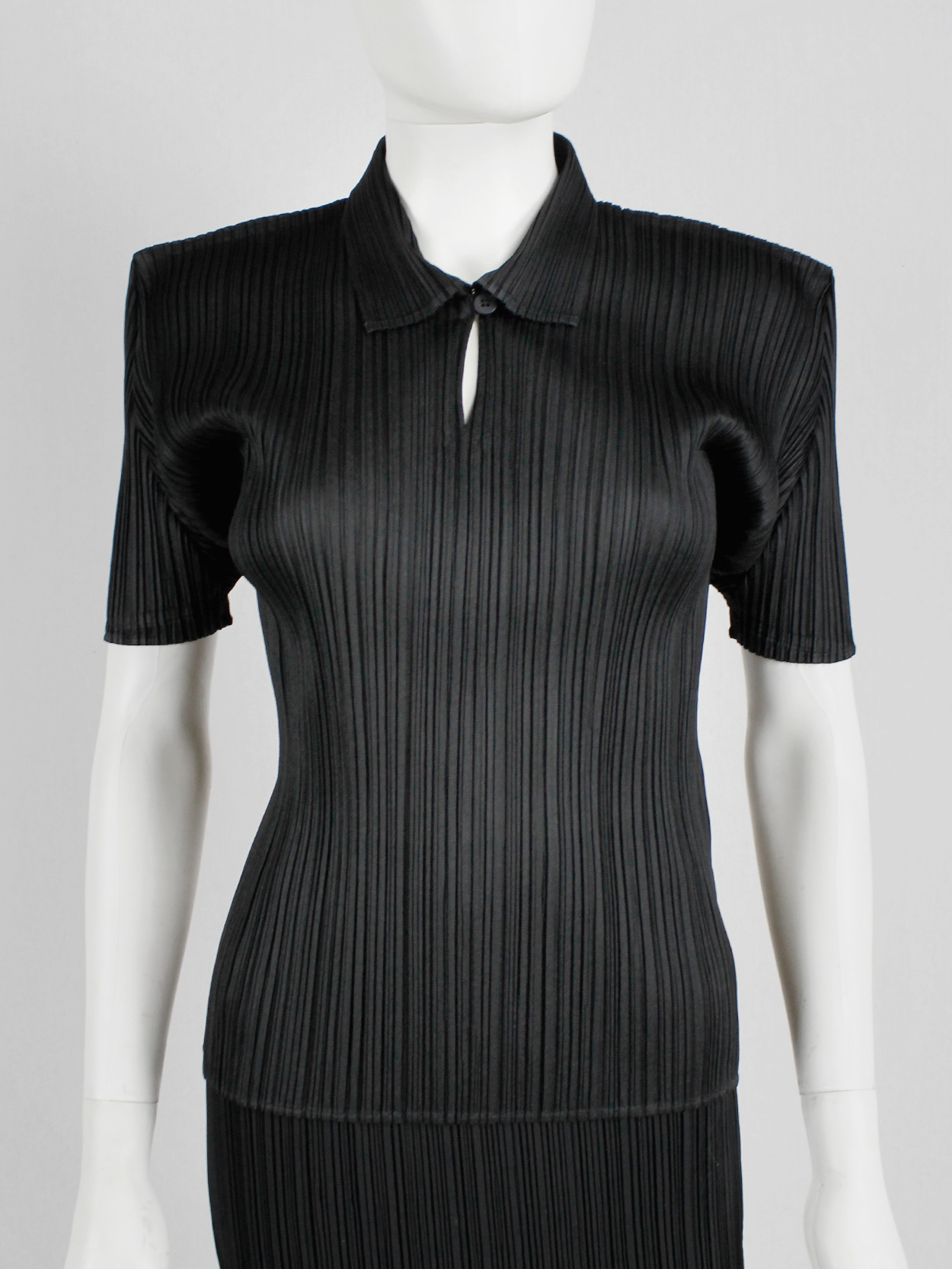 Issey Miyake Pleats Please black polo shirt with square shoulders 