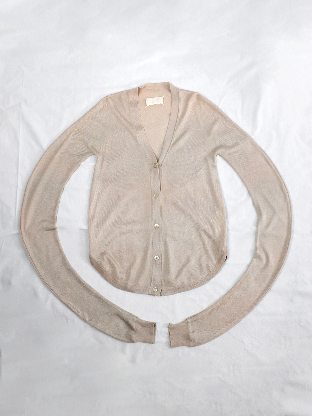 Maison Martin Margiela beige circular cardigan with twisted