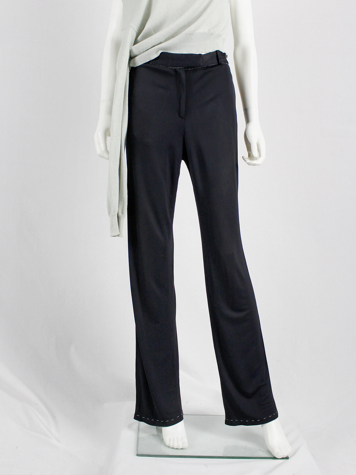 Maison Martin Margiela dark blue trousers with white exposed 