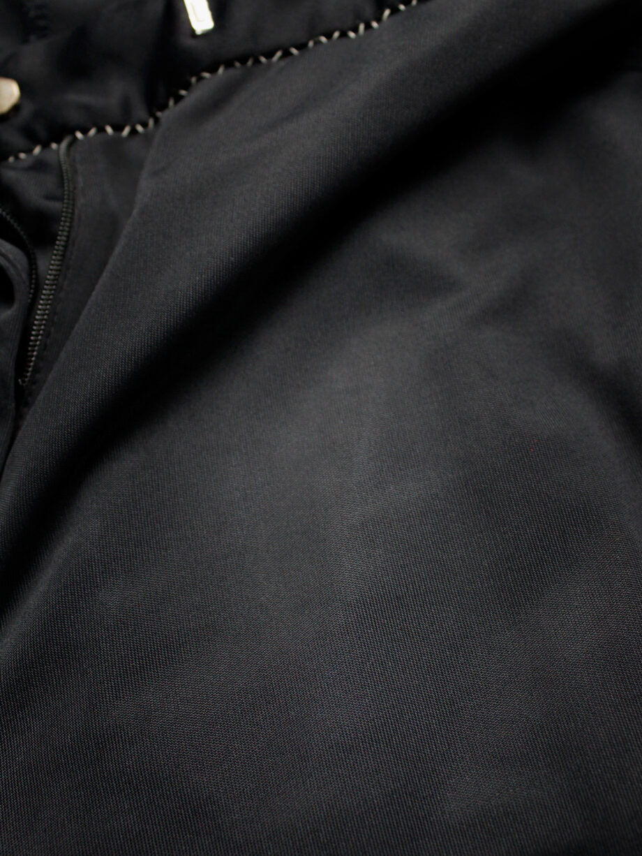 Maison Martin Margiela dark blue trousers with white exposed