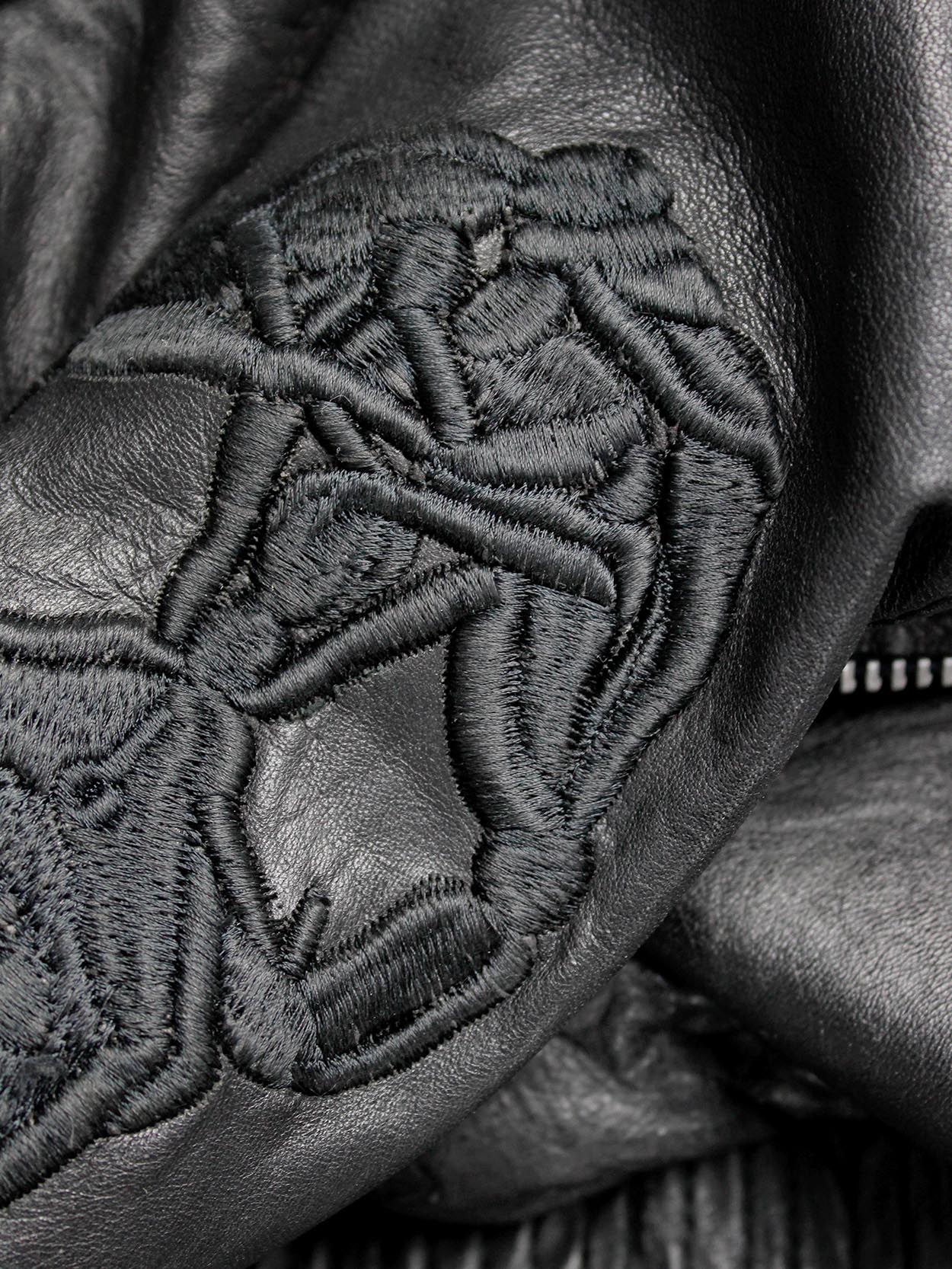 Marjan Pejoski black leather biker jacket with emboidered skull 