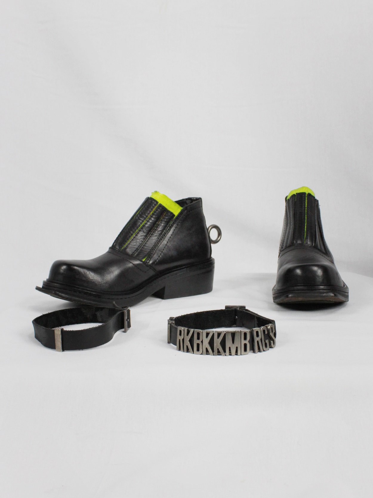 Dirk Bikkembergs black ankle boots with metal ring and neon