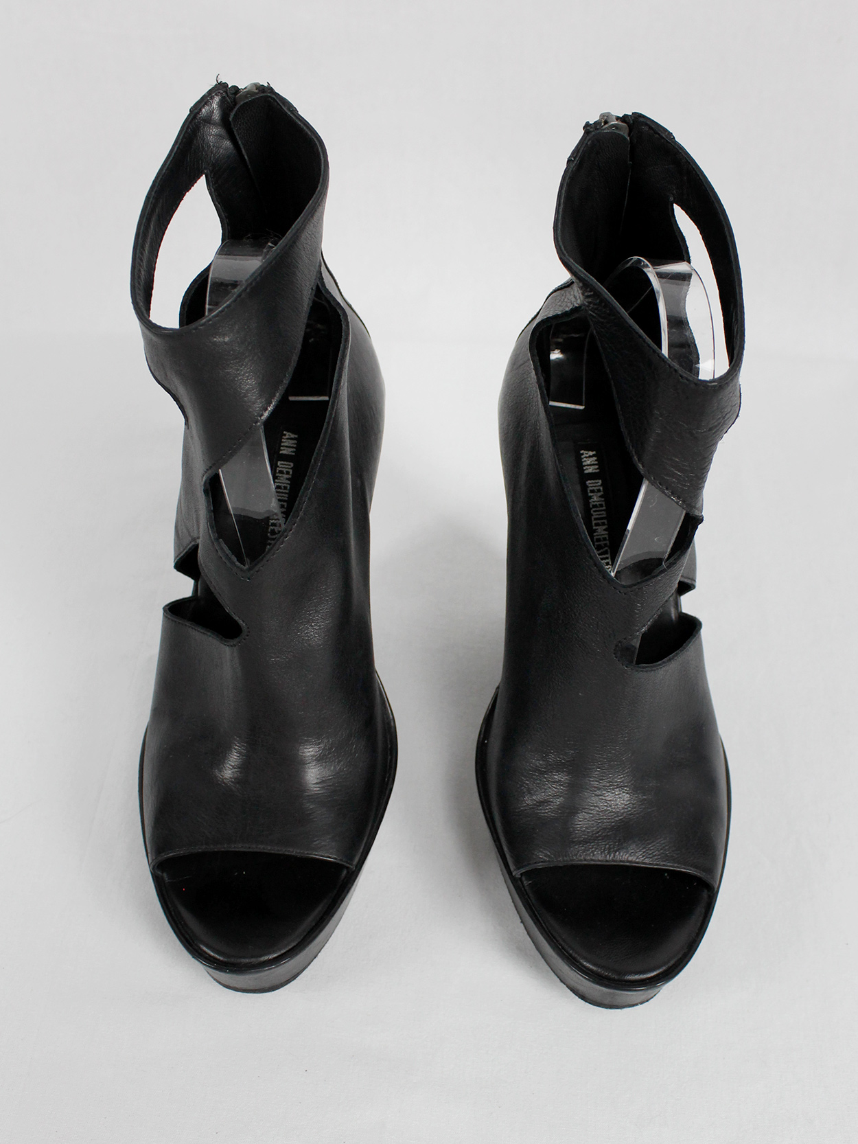 Ann Demeulemeester black platform boots with cut-out curved heel 