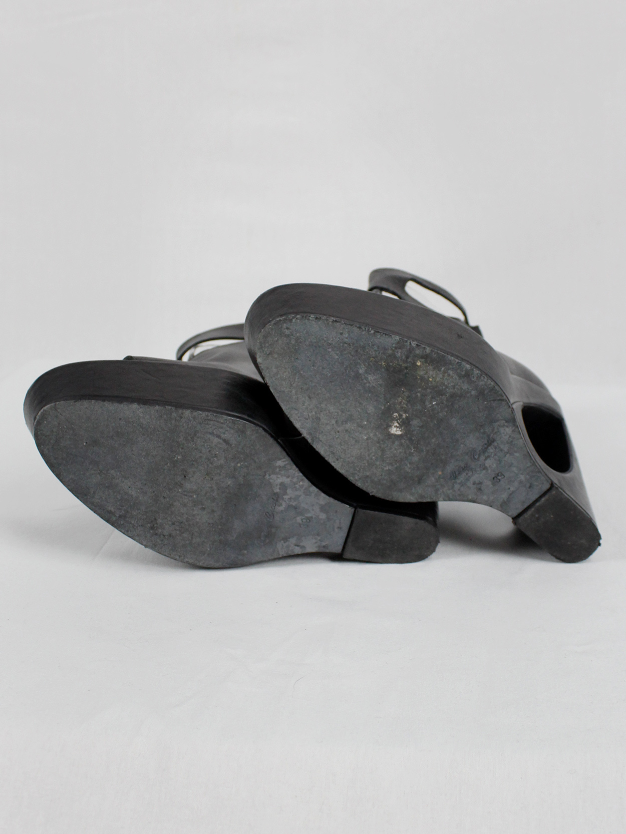 Ann Demeulemeester black platform boots with cut-out curved heel
