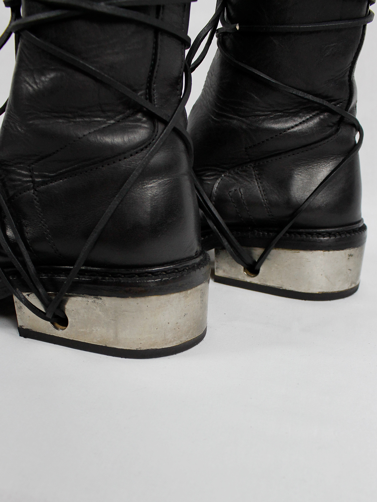 Dirk Bikkembergs black tall boots with laces through the metal 