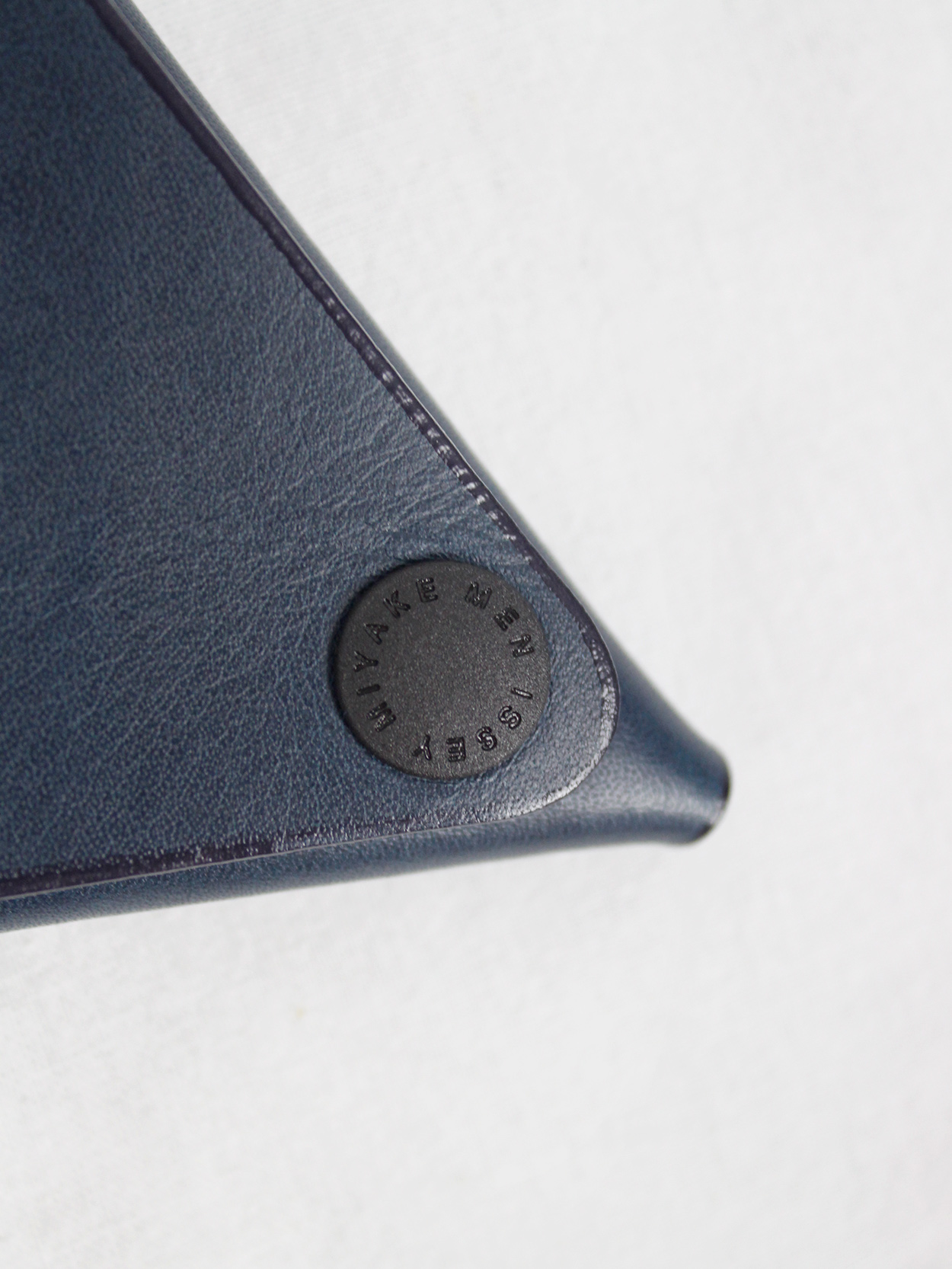 Issey Miyake Men navy triangular origami coin pouch - VANIITAS 