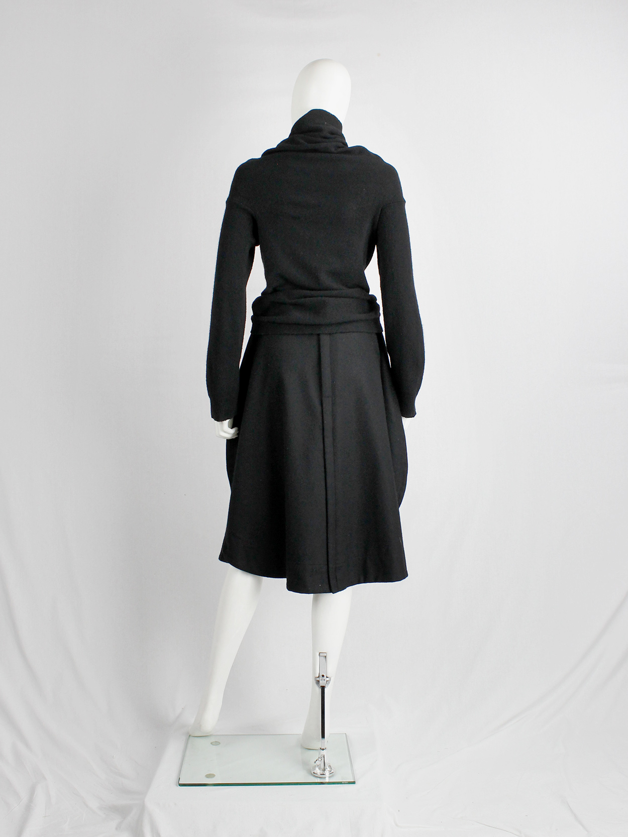 Comme des Garçons black circular cardigan with orange buttons and 