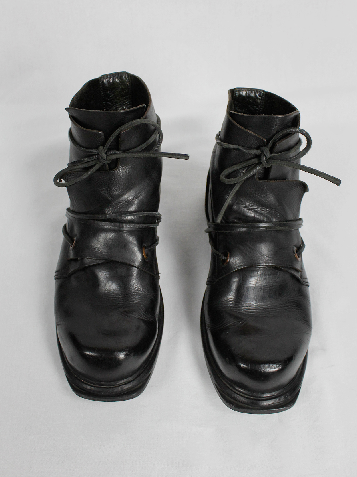 Dirk Bikkembergs black mountaineering boots with laces through the ...