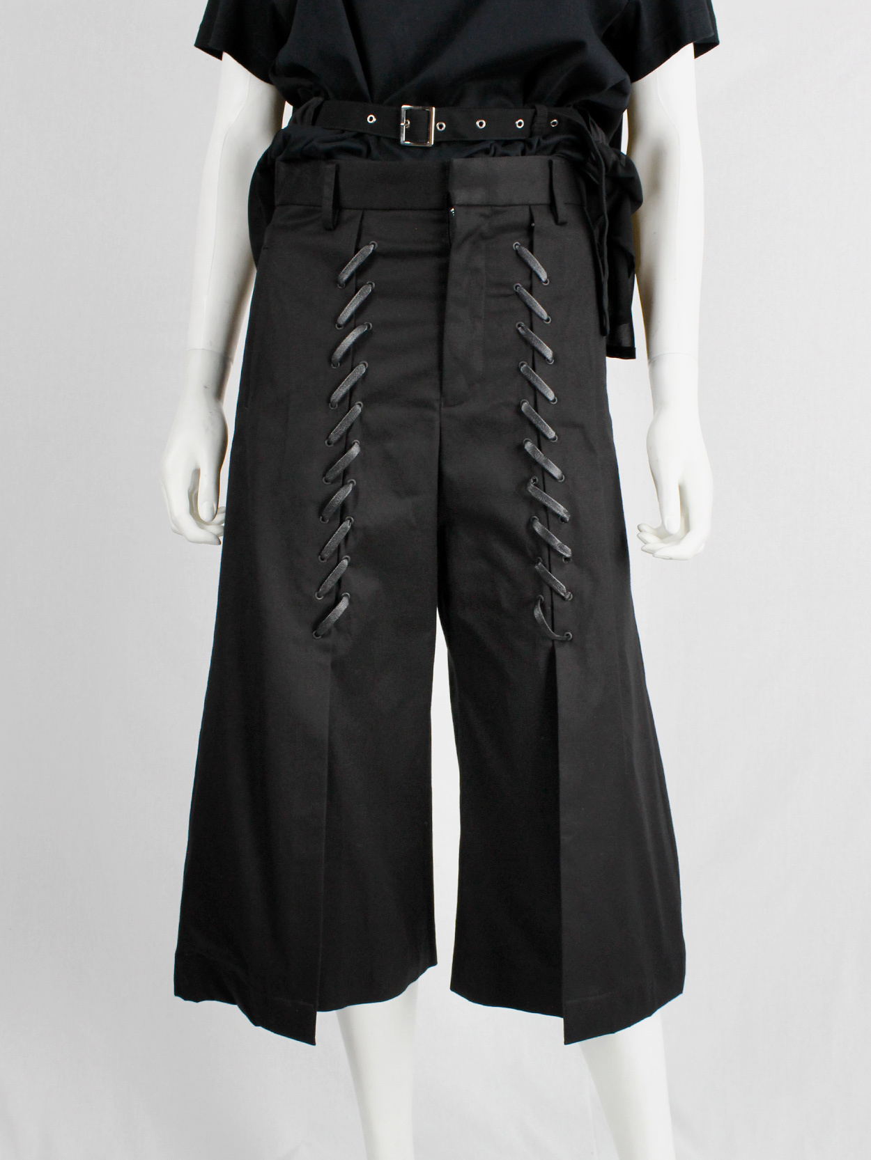 Noir Kei Ninomiya black cropped trousers with faux leather lacing 