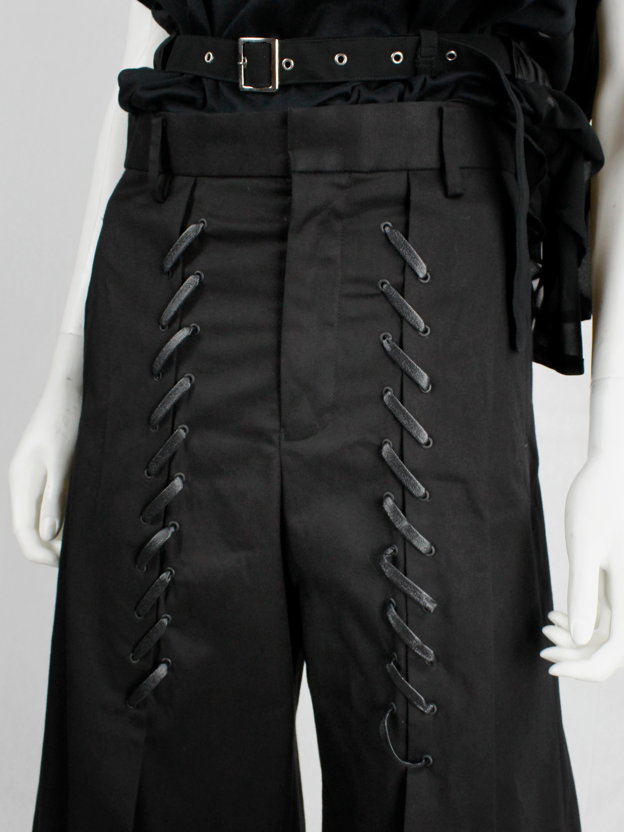 Noir Kei Ninomiya black cropped trousers with faux leather lacing 