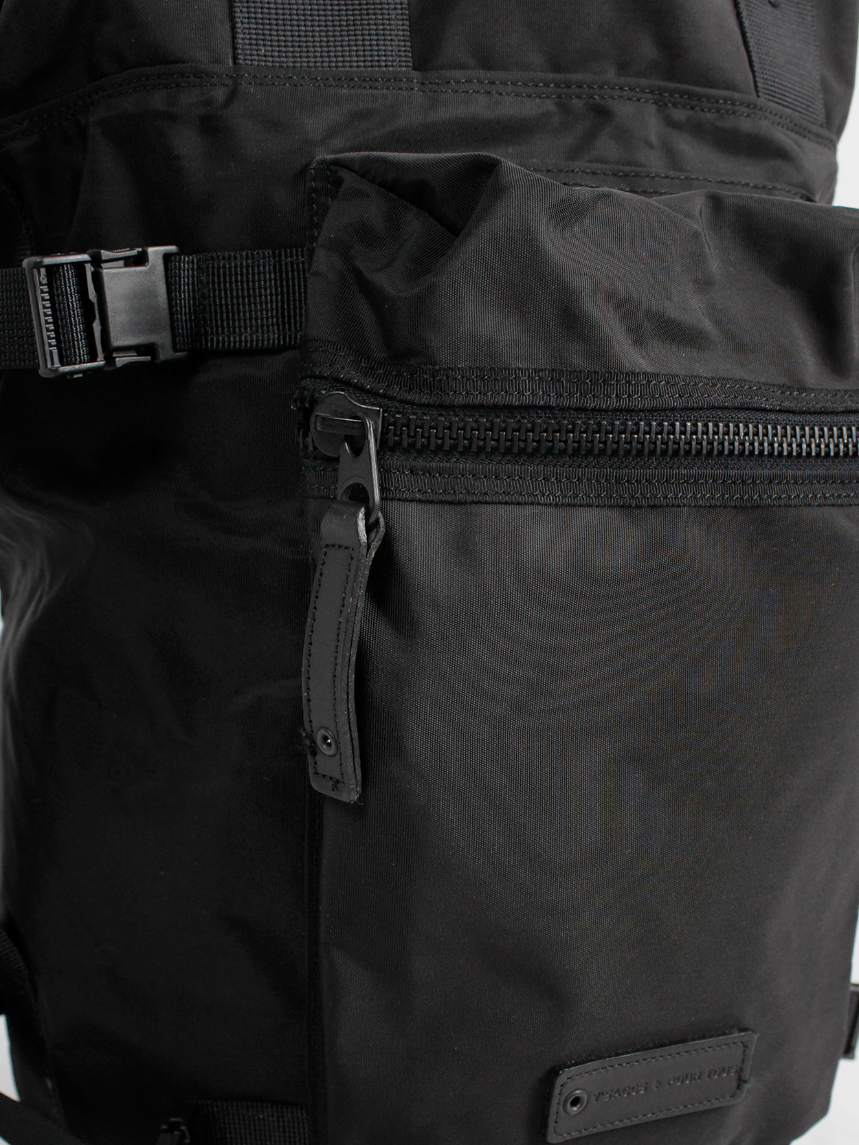 Y'SACCS Pour Tous black duffle bag with utility straps Y'SACCS Pour Tous black duffle bag with utility straps