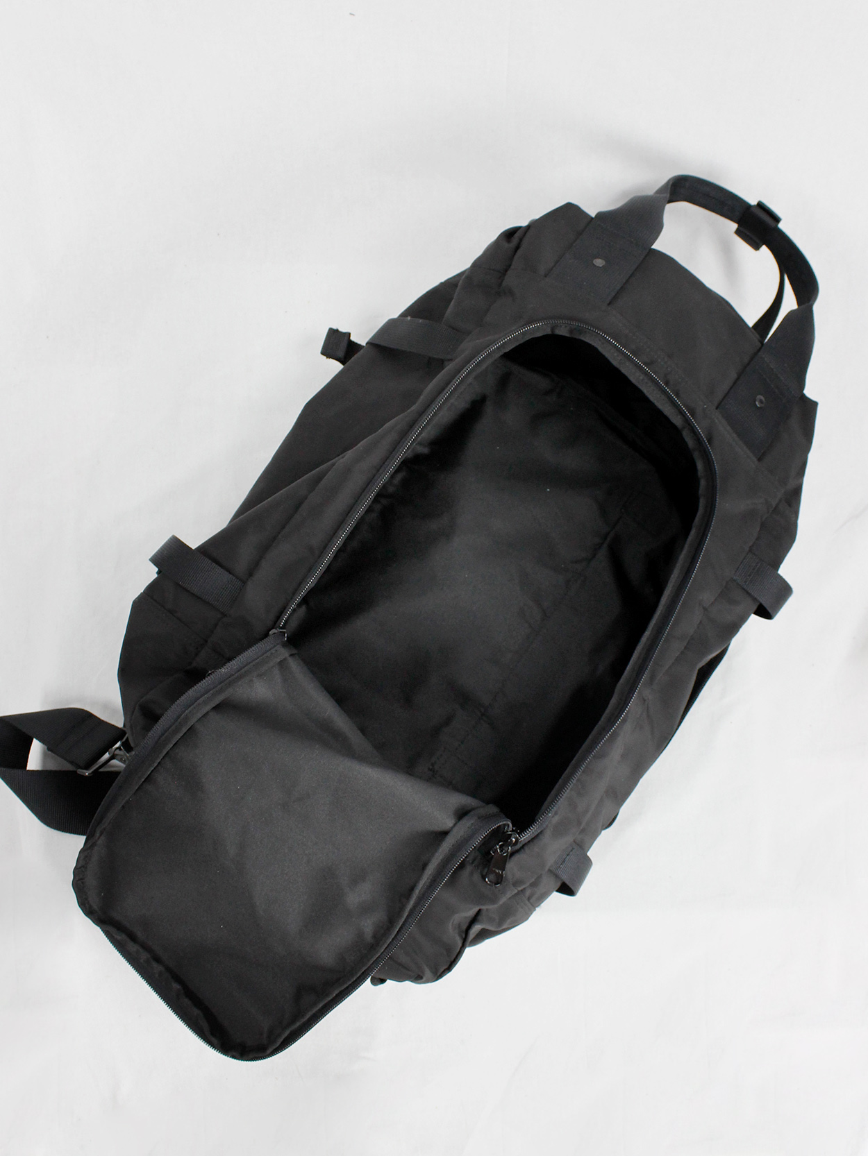 Y'SACCS Pour Tous black duffle bag with utility straps — 1990's