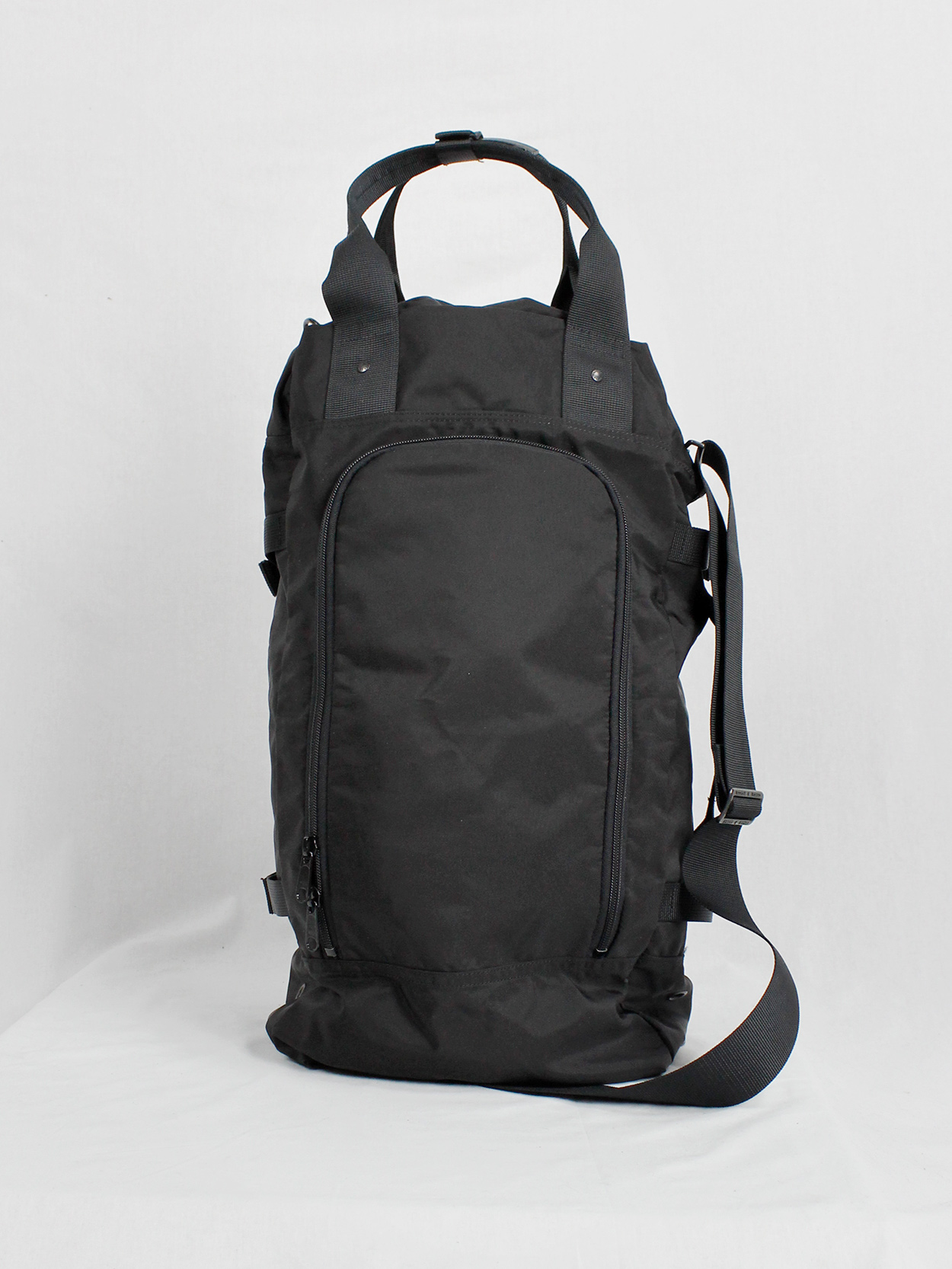 Y'SACCS Pour Tous black duffle bag with utility straps — 1990's