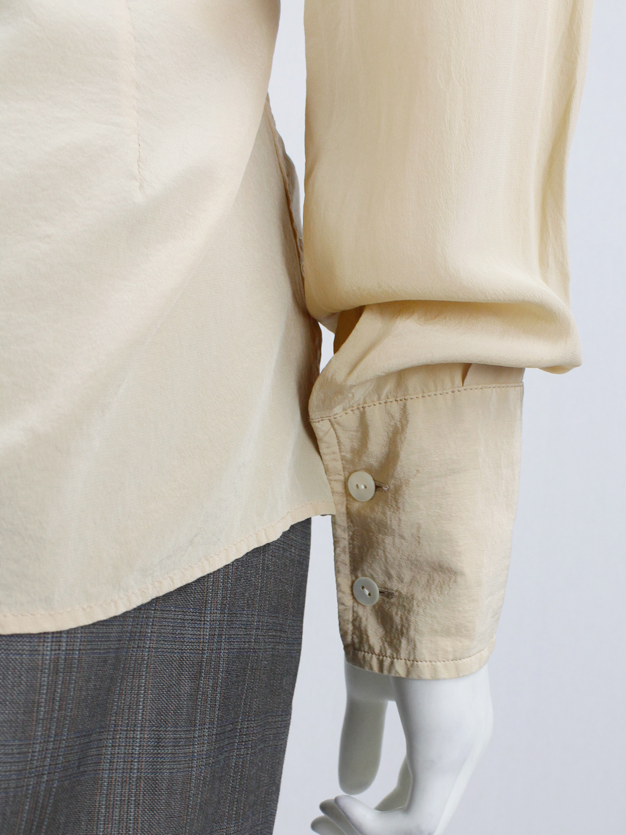 Maison Martin Margiela beige shirt that fully buttons up to the 