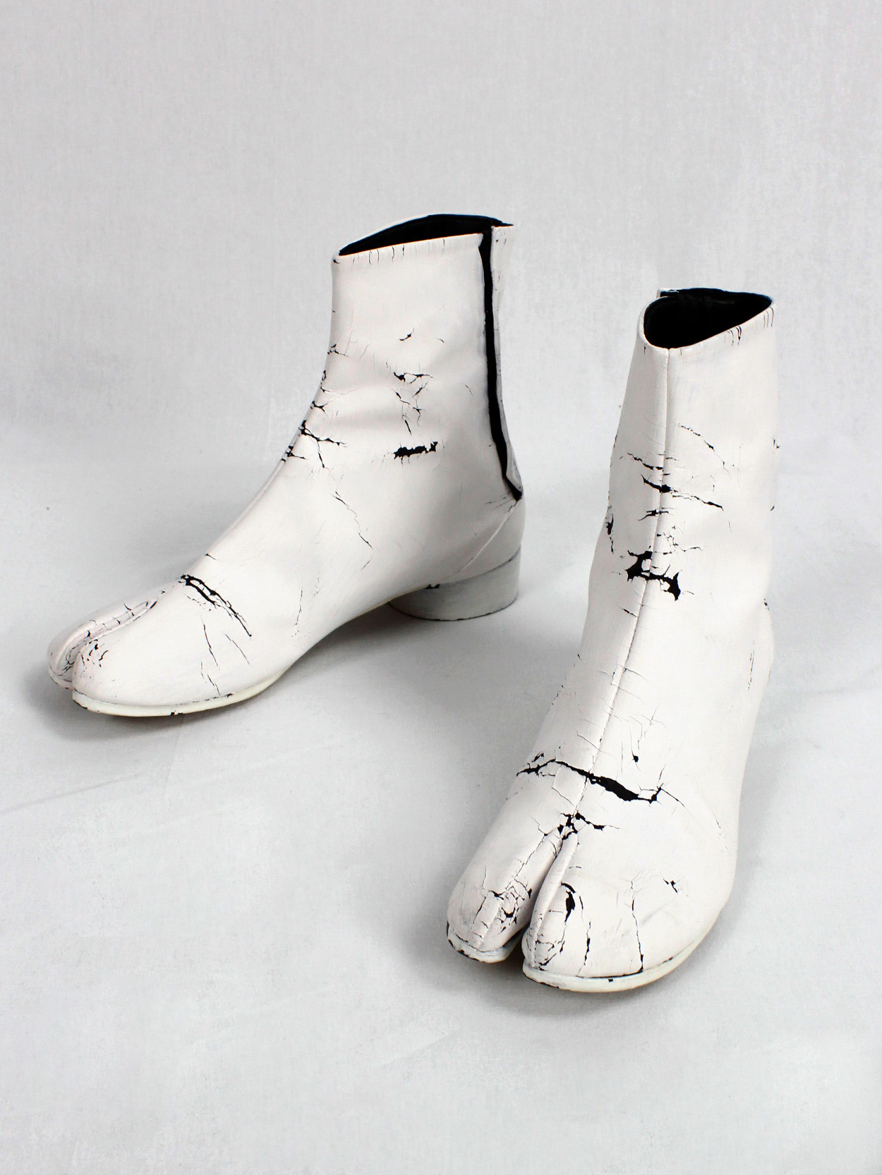 Maison Martin Margiela white painted tabi boots with low Maison Martin Margiela white painted tabi boots with low