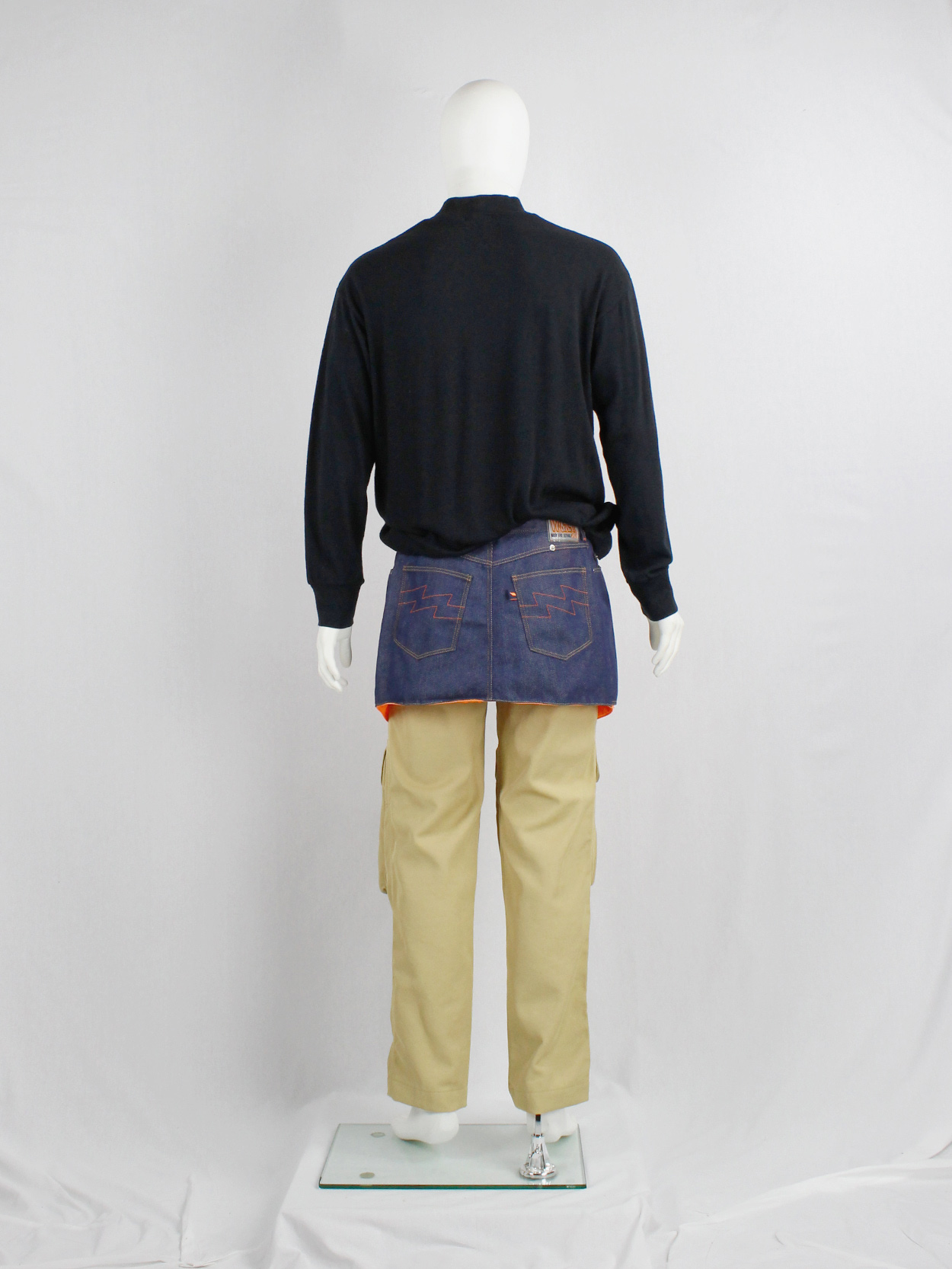 Walter Van Beirendonck W&LT denim trousers as a belt with neon 