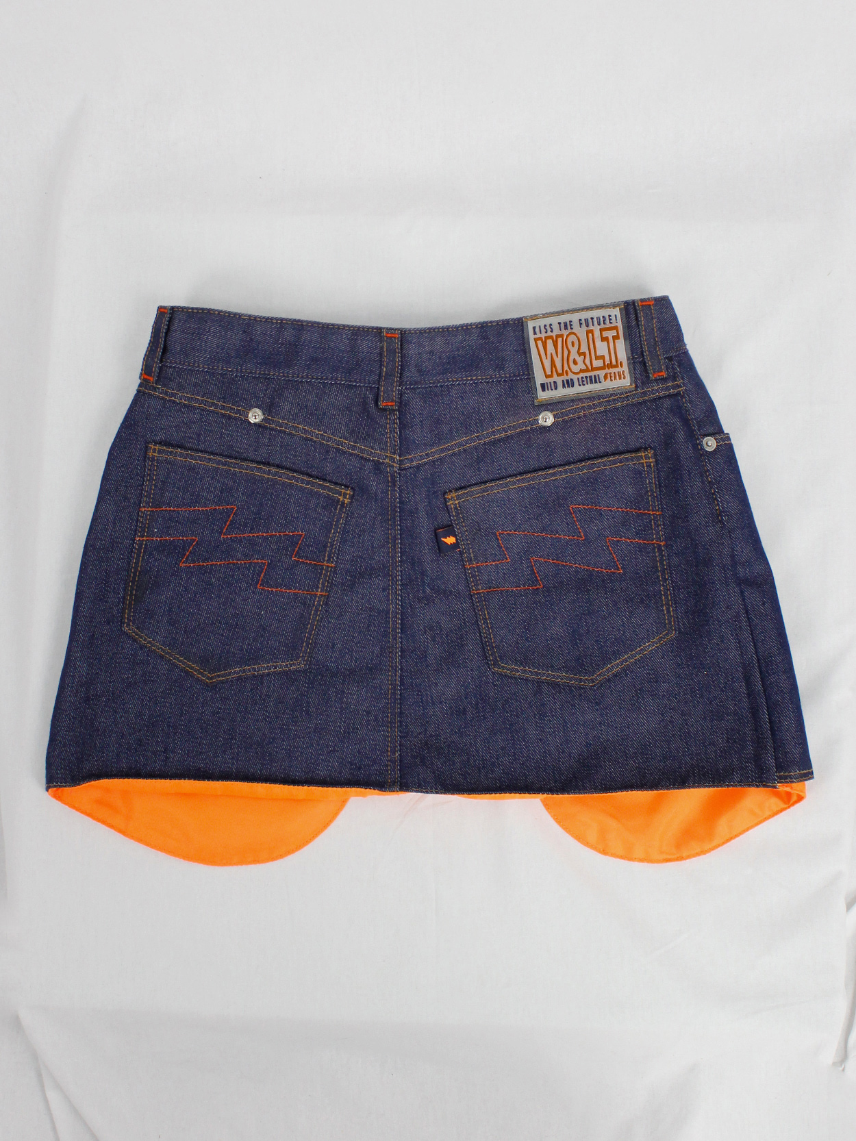 Walter Van Beirendonck W&LT denim trousers as a belt with neon 