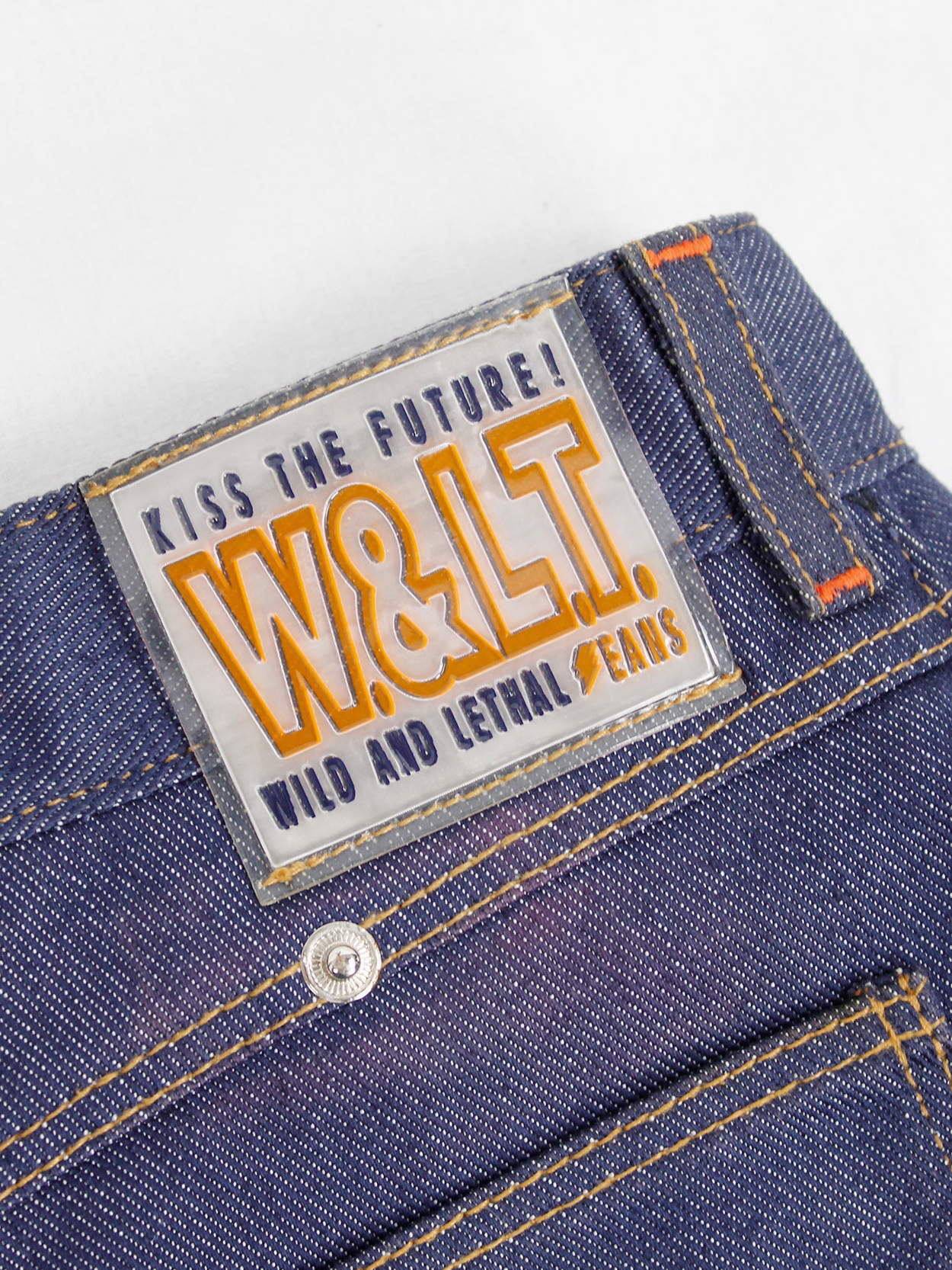 Walter Van Beirendonck W&LT denim trousers as a belt with neon 